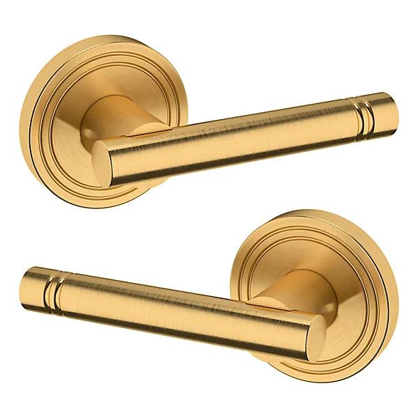 The Baldwin Estate 5138 Lever with 5047 Rosette in Lifetime Satin Brass finish.