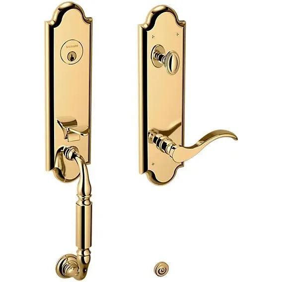 Baldwin Estate Manchester Single Cylinder Handleset With Interior 5455V Wave Lever in Unlacquered Brass finish
