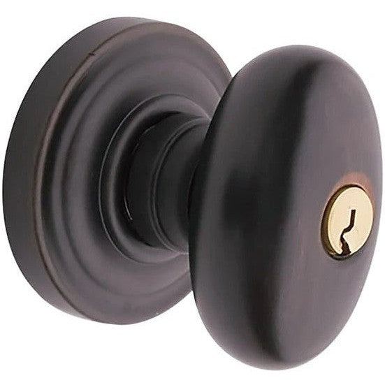 Baldwin Estate 5225 Keyed Egg Knob with Classic Rosette in Venetian Bronze finish