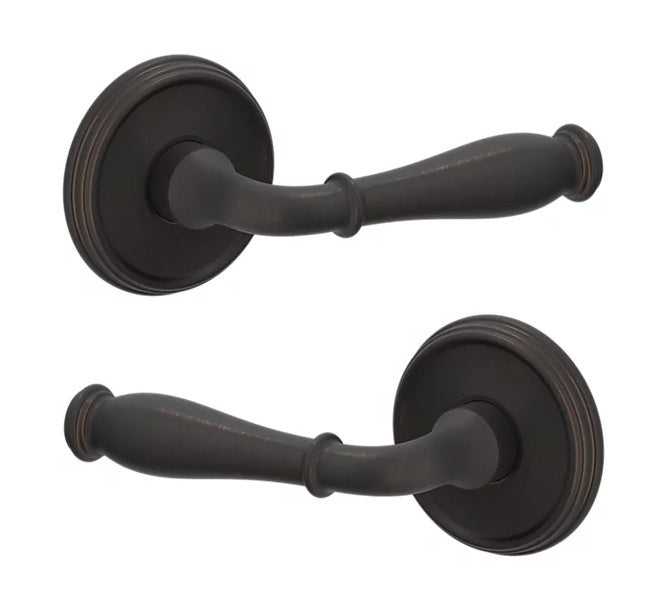 The Baldwin Estate L034 Nashville Lever with 5078 Rosette in Venetian Bronze finish.