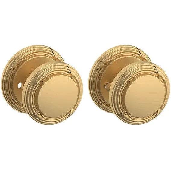 Baldwin Estate 5013 Privacy Knob with 5021 Rosette in Vintage Brass finish
