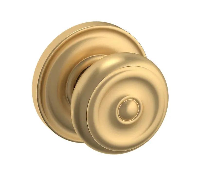 The Baldwin Estate 5020 Colonial Knob with 5048 Rosette in Vintage Brass finish.
