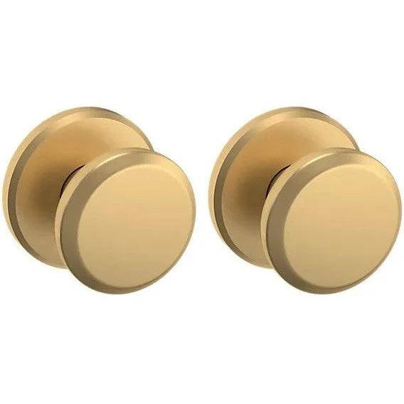 Baldwin Estate 5023 Passage Knob with R016 Rosette in Vintage Brass finish