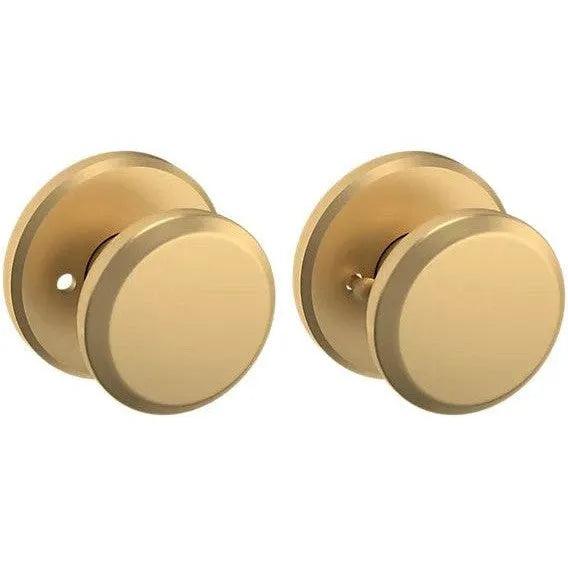 Baldwin Estate 5023 Privacy Knob with R016 Rosette in Vintage Brass finish