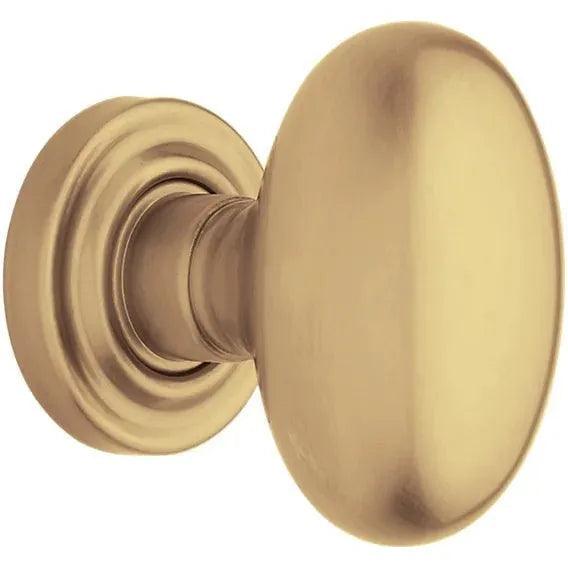 Baldwin Estate 5025 Half Dummy Knob with 5048 Rosette in Vintage Brass finish