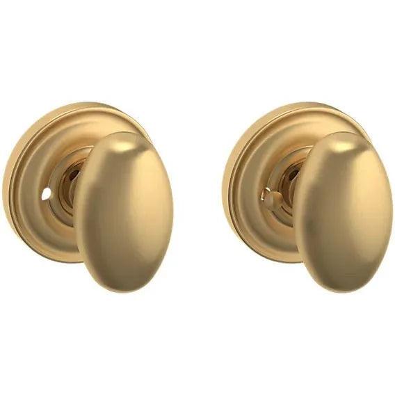 Baldwin Estate 5025 Privacy Knob with 5048 Rosette in Vintage Brass finish