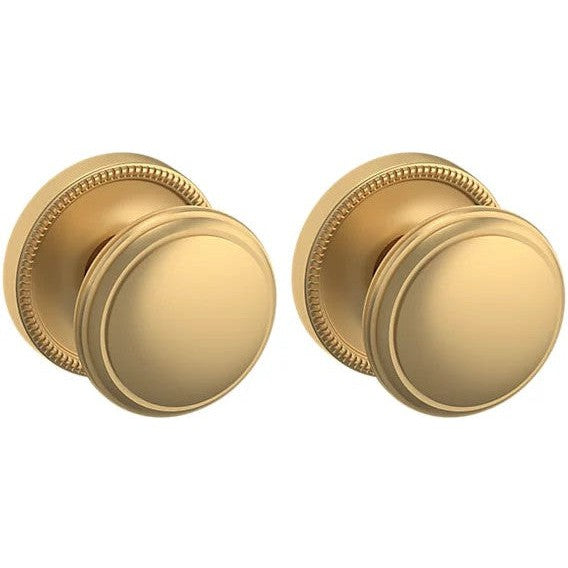 Baldwin Estate 5069 Full Dummy Knob with 5076 Rosette in Vintage Brass finish