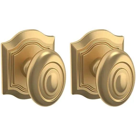 Baldwin Estate 5077 Bethpage Full Dummy Knob with R027 Rosette in Vintage Brass finish