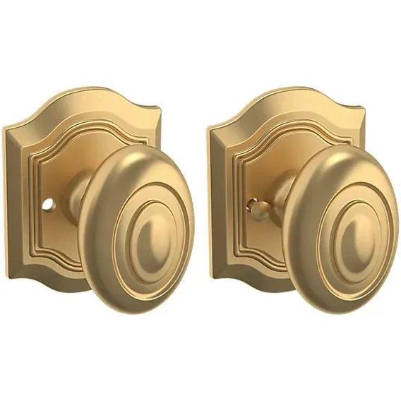 Baldwin Estate 5077 Bethpage Privacy Knob with R027 Rosette in Vintage Brass finish