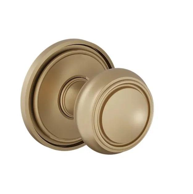 The Baldwin Estate 5087 Nashville Knob (2") with 5070 Rosette in Vintage Brass finish.