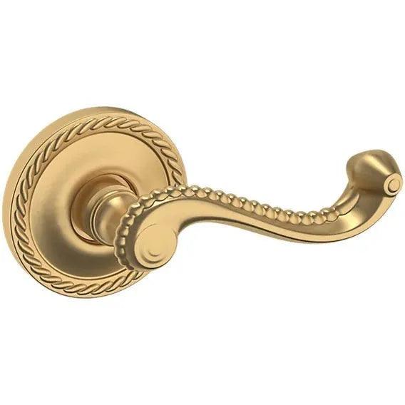 Baldwin Estate 5104 Right Handed Half Dummy Lever with 5004 Rosette in Vintage Brass finish
