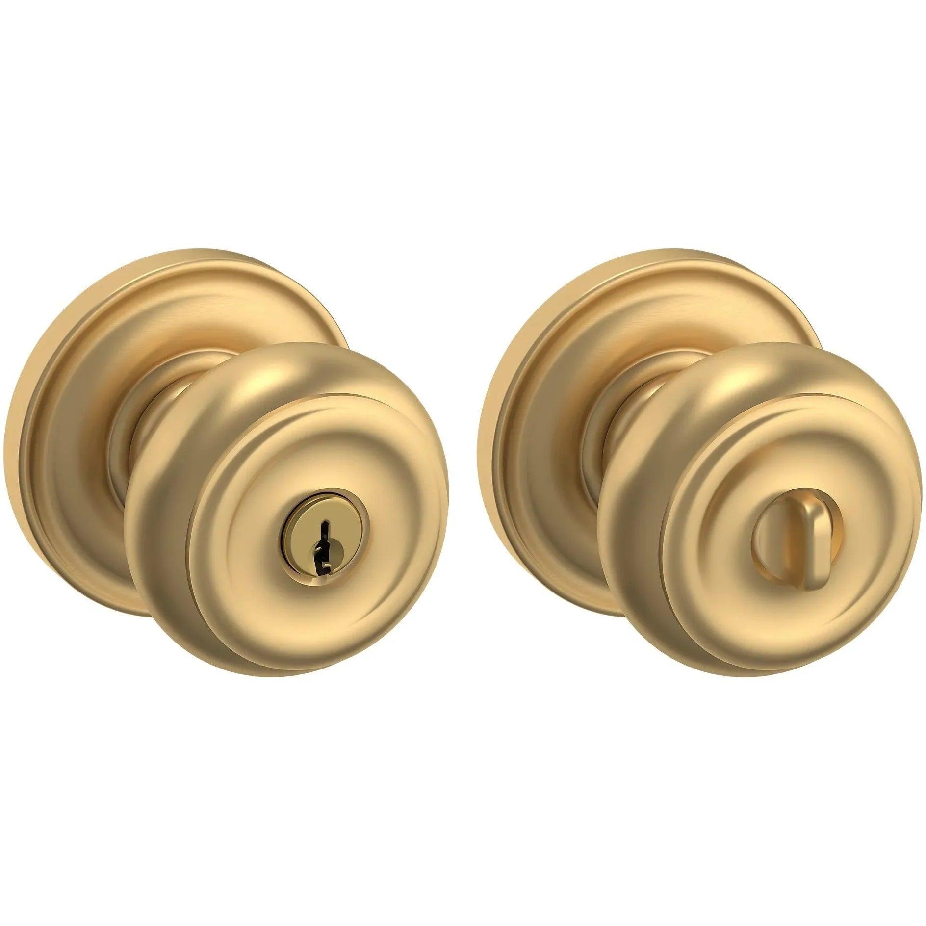 Baldwin Estate 5210 Keyed Colonial Knob with Classic Rosette in Vintage Brass finish