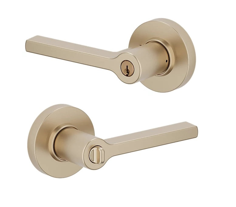 The Baldwin Estate 5260 Minneapolis Keyed Lever with Round Rosette in Vintage Brass finish.