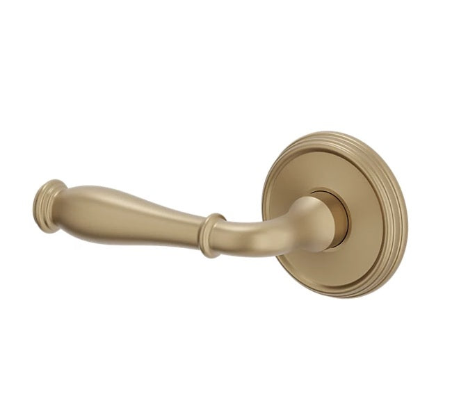 The Baldwin Estate L034 Nashville Lever with 5078 Rosette in Vintage Brass finish.