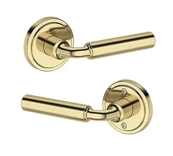 Baldwin La Connor Lever with Stepped Round Rosette in Non-Lacquered Brass finish