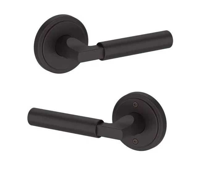 Baldwin Lake Forest Lever with Stepped Round Rosette in Venetian Bronze finish