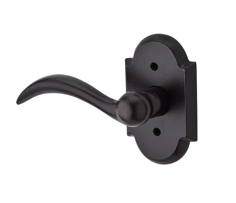 The Baldwin Reserve Arch Lever with Rustic Arch Rosette in Dark Bronze finish.