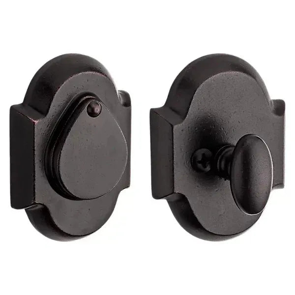 The Baldwin Reserve Rustic Arch Deadbolt in Dark Bronze finish.