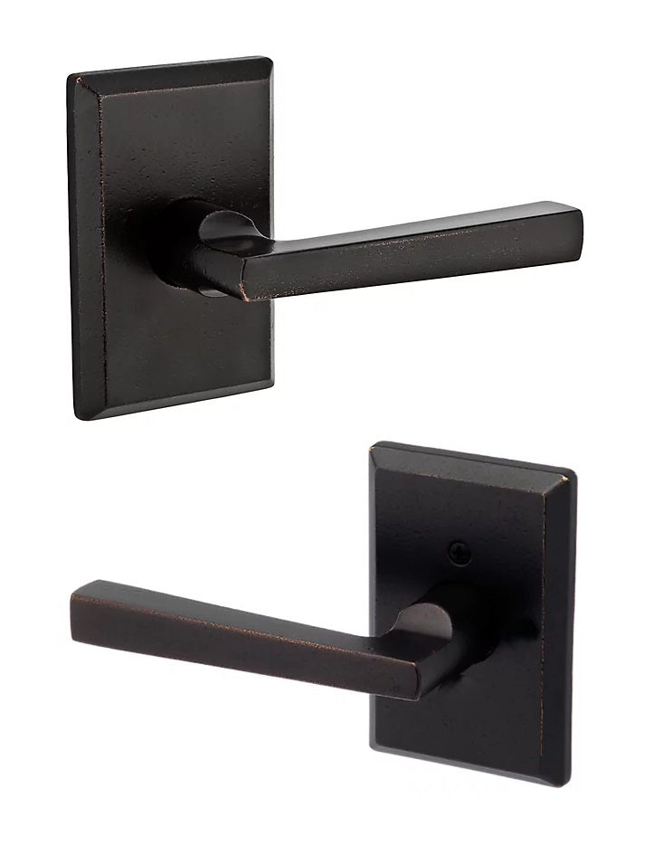 The Baldwin Reserve Taper Lever with Rustic Square Rosette in Dark Bronze finish.