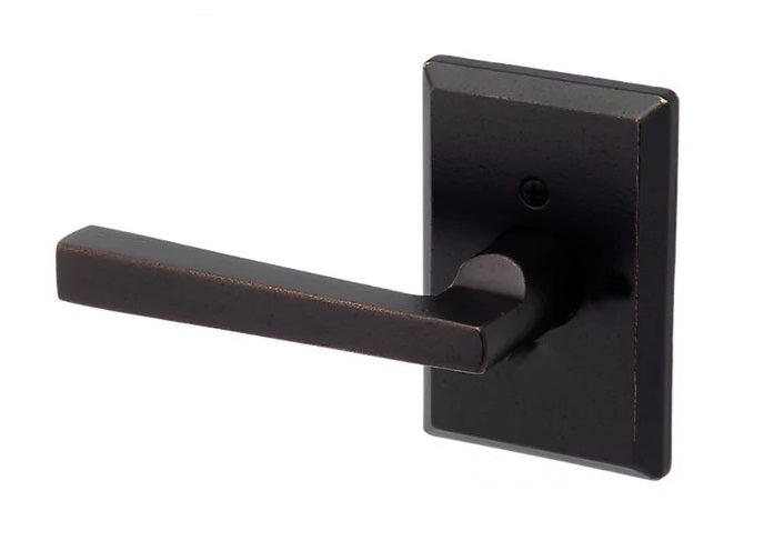 The Baldwin Reserve Taper Lever with Rustic Square Rosette in Dark Bronze finish.