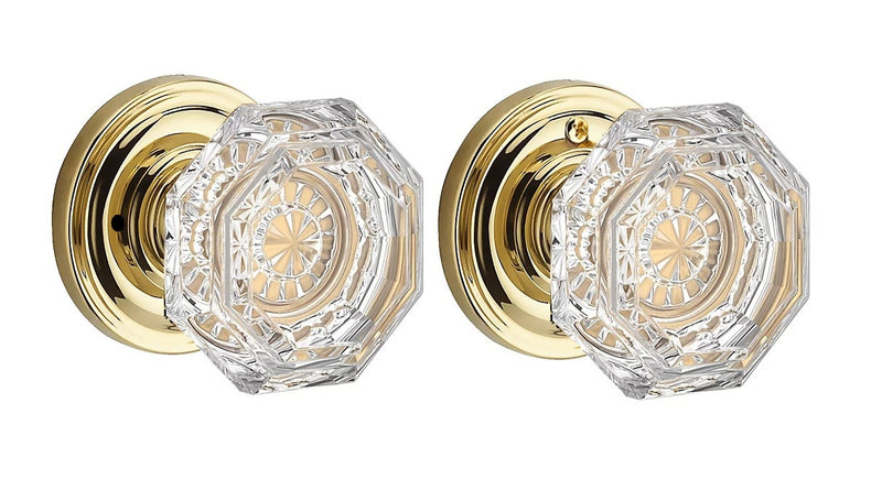 The Baldwin Reserve Crystal Knob with Traditional Round Rosette in Lifetime Polished Brass finish.