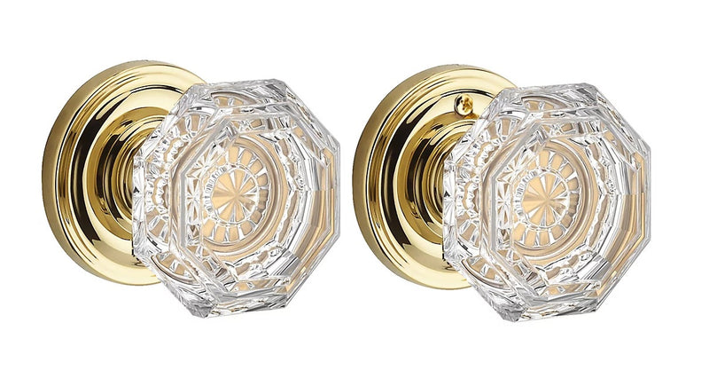 The Baldwin Reserve Crystal Knob with Traditional Round Rosette in Lifetime Polished Brass finish.