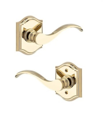 The Baldwin Reserve Curve Lever with Traditional Arch Rosette in Lifetime Polished Brass finish.