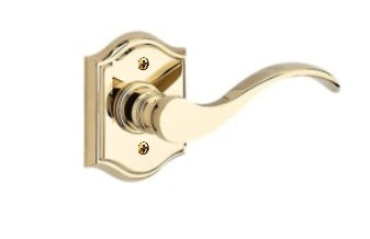 The Baldwin Reserve Curve Lever with Traditional Arch Rosette in Lifetime Polished Brass finish.