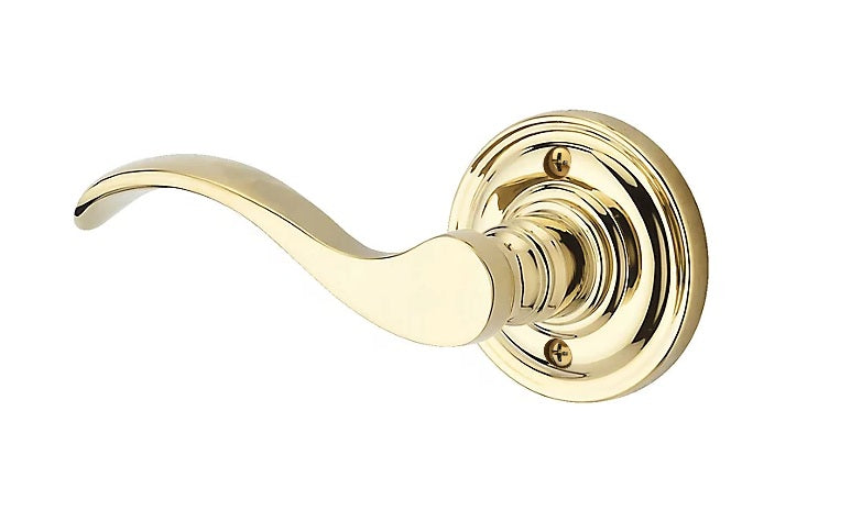 The Baldwin Reserve Curve Lever with Traditional Round Rosette in Lifetime Polished Brass finish.