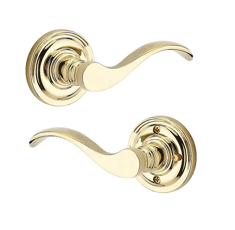 The Baldwin Reserve Curve Lever with Traditional Round Rosette in Lifetime Polished Brass finish.
