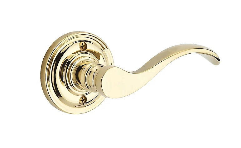 The Baldwin Reserve Curve Lever with Traditional Round Rosette in Lifetime Polished Brass finish.
