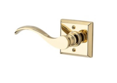 The Baldwin Reserve Curve Lever with Traditional Square Rosette in Lifetime Polished Brass finish.