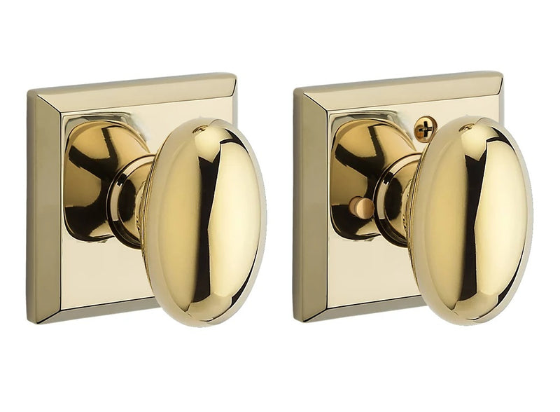 The Baldwin Reserve Ellipse Knob with Traditional Square Rosette in Lifetime Polished Brass finish.