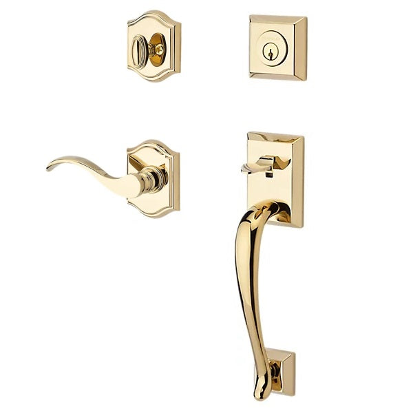 The Baldwin Reserve Napa Handleset with Interior Curve Lever with Traditional Arch Rosette in Lifetime Polished Brass finish.