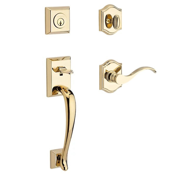 The Baldwin Reserve Napa Handleset with Interior Curve Lever with Traditional Arch Rosette in Lifetime Polished Brass finish.