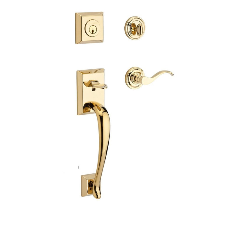 The Baldwin Reserve Napa Handleset with Interior Curve Lever with Traditional Round Rosette in Lifetime Polished Brass finish.