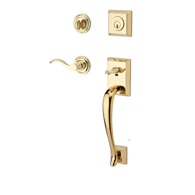 The Baldwin Reserve Napa Handleset with Interior Curve Lever with Traditional Round Rosette in Lifetime Polished Brass finish.