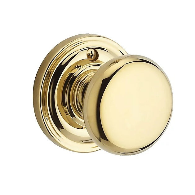 The Baldwin Reserve Round Knob with Traditional Round Rosette in Lifetime Polished Brass finish.