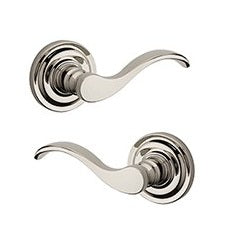 The Baldwin Reserve Curve Lever with Traditional Round Rosette in Lifetime Polished Nickel finish.