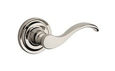 The Baldwin Reserve Curve Lever with Traditional Round Rosette in Lifetime Polished Nickel finish.