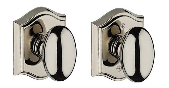 The Baldwin Reserve Ellipse Knob with Traditional Arch Rosette in Lifetime Polished Nickel finish.