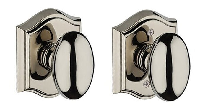 The Baldwin Reserve Ellipse Knob with Traditional Arch Rosette in Lifetime Polished Nickel finish.