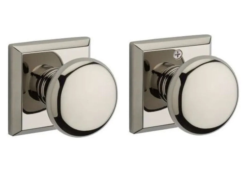 The Baldwin Reserve Round Knob with Traditional Square Rosette in Lifetime Polished Nickel finish.