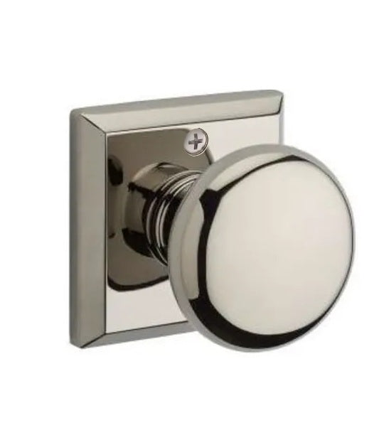 The Baldwin Reserve Round Knob with Traditional Square Rosette in Lifetime Polished Nickel finish.
