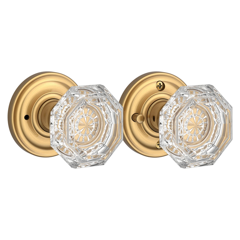 The Baldwin Reserve Crystal Knob with Traditional Round Rosette in Lifetime Satin Brass finish.