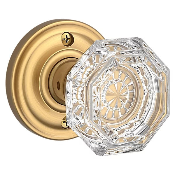 The Baldwin Reserve Crystal Knob with Traditional Round Rosette in Lifetime Satin Brass finish.