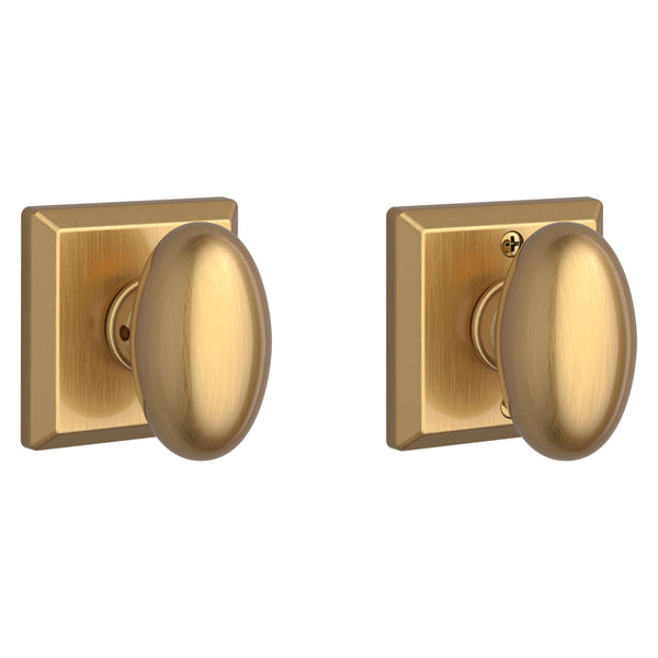 The Baldwin Reserve Ellipse Knob with Traditional Square Rosette in Lifetime Satin Brass finish.
