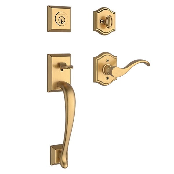 The Baldwin Reserve Napa Handleset with Interior Curve Lever with Traditional Arch Rosette in Lifetime Satin Brass finish.