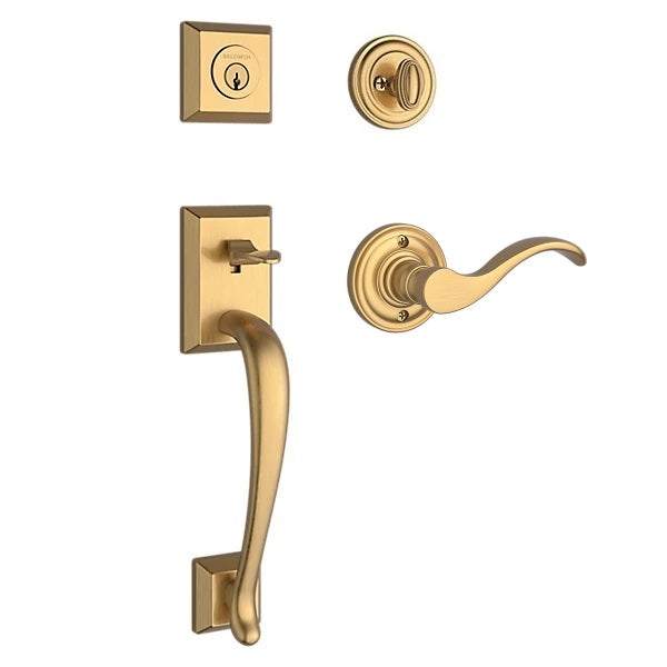 The Baldwin Reserve Napa Handleset with Interior Curve Lever with Traditional Round Rosette in Lifetime Satin Brass finish.