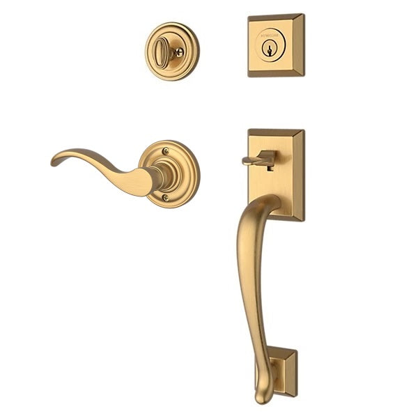 The Baldwin Reserve Napa Handleset with Interior Curve Lever with Traditional Round Rosette in Lifetime Satin Brass finish.